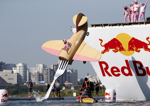 A participant attempts to control a craft during the Red Bull Flugtag Russia 2015 competition in Moscow