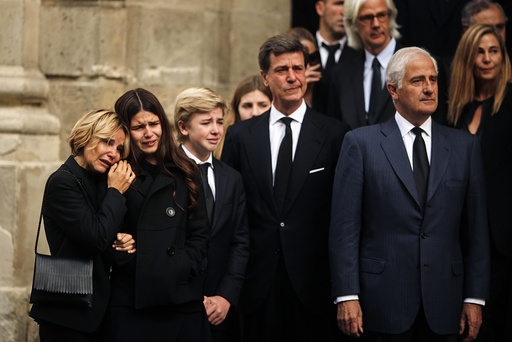 Children of Spain's Duchess of Alba Cayetana Fitz-James Stuart y Silva and other relatives cry as they leave the townhall for her funeral in Seville