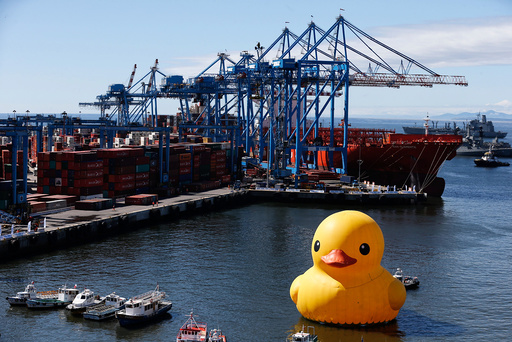 An installation of an inflatable Rubber Duck made by Dutch artist, Florentijn Hofman, is seen in Valparaiso port