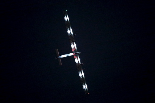 Solar Impulse 2, solar powered plane, circles above Nagoya airport in Japan