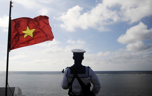 A Vietnamese naval soldier stands quard at Thuyen Chai island in the Spratly archipelago