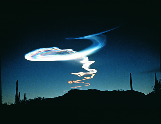 Nacreous noctilucent cloud formed by rocket trail