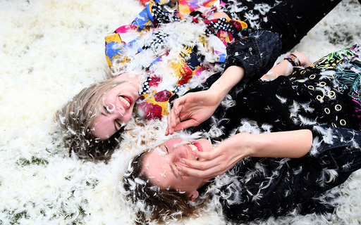 Participants take part in International Pillow Fight Day in Kennington Park in south London