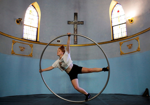 Aerial Emery trains on the cyr wheel at the Aloft Loft circus training and teaching school which was converted from a church in Chicago