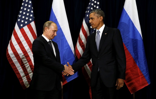 U.S. President Barack Obama shakes hands with Russian President Vladimir Putin during their meeting at the United Nations General Assembly in New York