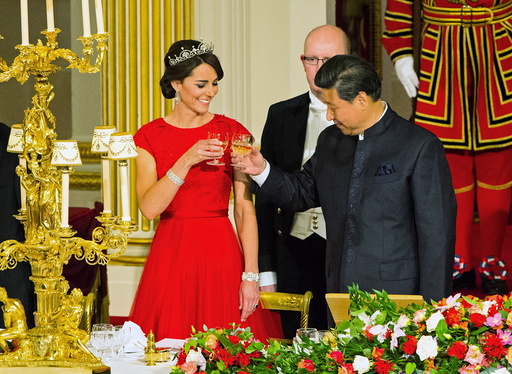 Chinese President Xi Jinping with the Duchess of Cambridge at a state banquet at Buckingham Palace, London, during the first day of his state visit to Britain