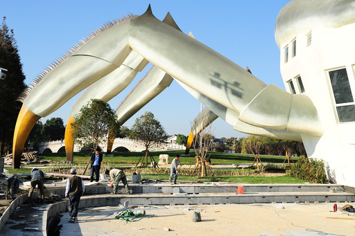 A crab-shaped eco pavilion is seen under construction on the banks of Yangcheng lake in Kunshan