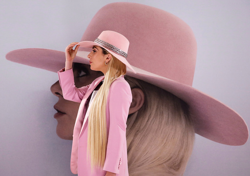 Singer Lady Gaga poses for photographers during a photo call to promote her new album 'Joanne' in Tokyo