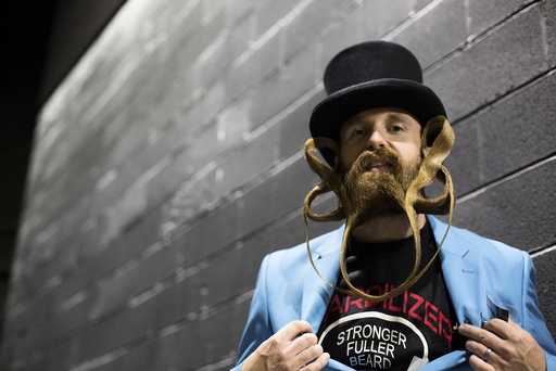 Chris Bates from Detroit, Michigan, poses for a photograph at the 2015 Just For Men National Beard & Moustache Championships at the Kings Theater in the Brooklyn borough of New York