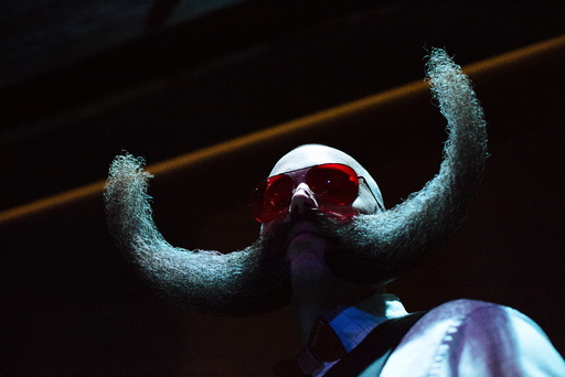 M.J. Johnson from Minneapolis, Minnesota, poses for a photograph at the 2015 Just For Men National Beard & Moustache Championships at the Kings Theater in the Brooklyn borough of New York
