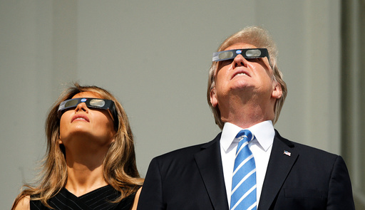 Trump watches the solar eclipse from the White House in Washington