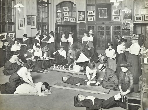 Practical first aid class for women, Blackheath Road Evening Institute, 1914. Artist: Unknown.