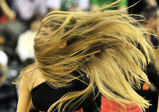 A cheerleader from the group Dragon Ladies performs during the Euroleague basketball match between Union Olimpija and Lottomatica Roma in Ljubljana
