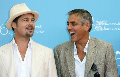 U.S. actors Clooney and Pitt pose during photocall in Venice