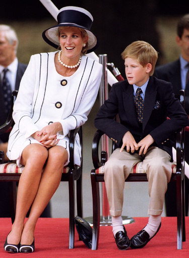 The Princess of Wales and Prince Harry attend VJ (Victory over Japan) Day ceremonies in the Mall Aug..