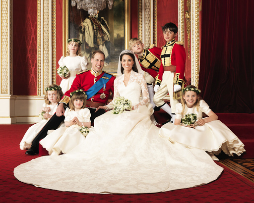 Britain's Prince William and his bride Catherine, Duchess of Cambridge, pose for an official photograph, with their bridesmaids and pageboys, on the day of their wedding, in the throne room at Buckingham Palace, in central London