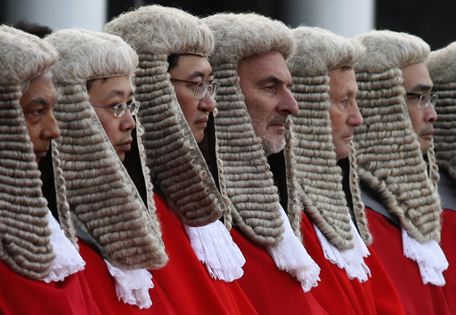 Judges wearing wigs attend a ceremony to mark the beginning of the new legal year in Hong Kong