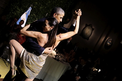 U.S. President Barack Obama dances tango during a state dinner hosted by Argentina's President Mauricio Macri at the Centro Cultural Kirchner in Buenos Aires