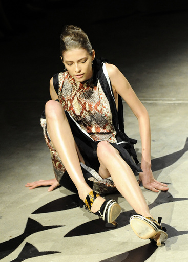 A model falls during Prada's Spring/Summer 2009 women's collection at Milan Fashion Week