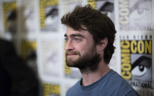 Cast member Radcliffe poses at a press line for 