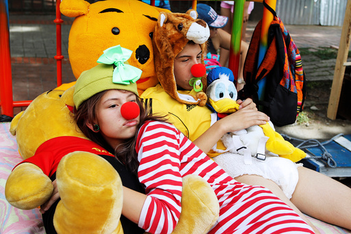 People dressed in pajamas while participating in an event marking the World Day of laziness Itagui