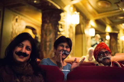 Ramesh Parekh and family watch contestants at the 2015 Just For Men National Beard & Moustache Championships at the Kings Theater in the Brooklyn borough of New York
