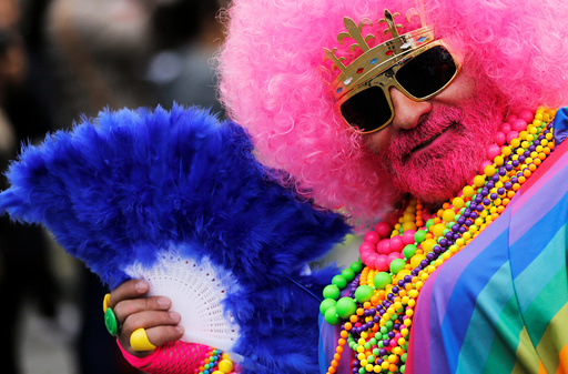 A participant poses during the annual Belgian LGBT Pride Parade in central Brussels