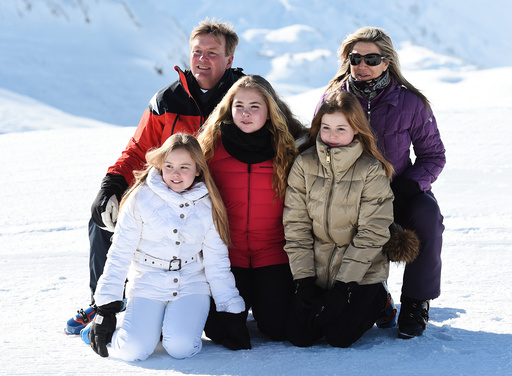 King Willem-Alexander and Queen Maxima of the Netherlands pose with their daughters in Lech am Arlberg