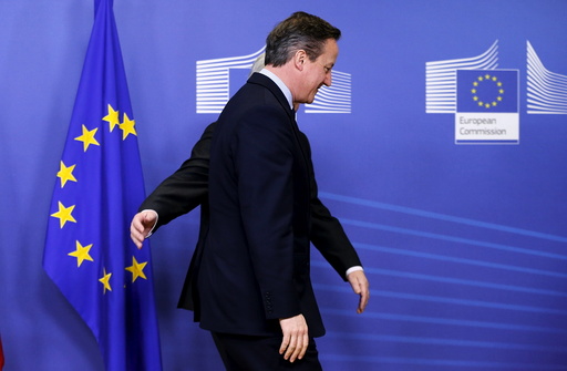Britain's PM Cameron is welcomed by EU Commission President Juncker in Brussels