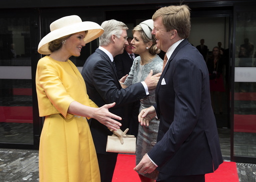 Netherlands' Queen Maxima and King Willem Alexander are welcomed by Belgium's King Philippe and Queen Mathilde ahead of a ceremony as part of the bicentennial celebrations for the Battle of Waterloo in Waterloo