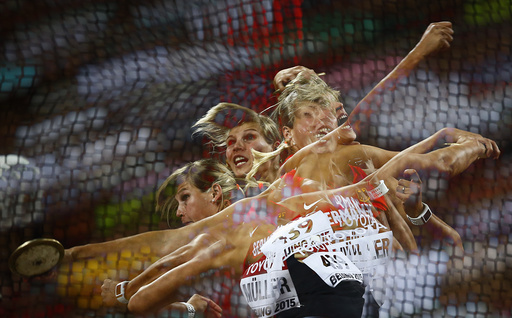 Mueller of Germany competes to win bronze in women's discus throw final at 15th IAAF World Championships in Beijing