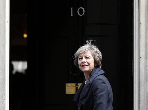 Britain's Home Secretary Theresa May, who is due to take over as prime minister on Wednesday, arrives for a cabinet meeting at number 10 Downing Street, in central London, Britain