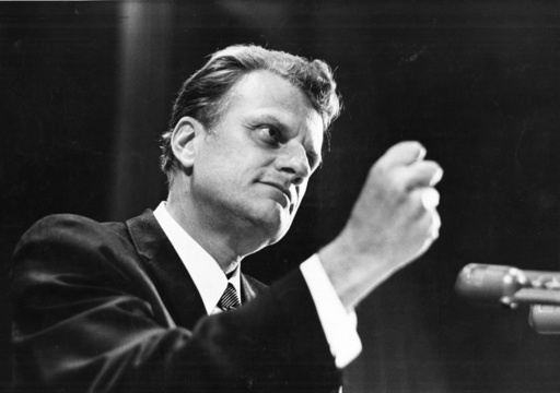 The Rev. Billy Graham speaks to an audience of police officers at the Waldorf Astoria Hotel in New York in May 1969.
