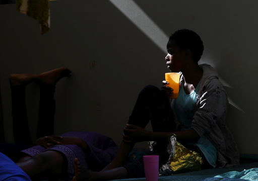A migrant drinks water on the deck of the Medecins san Frontiere (MSF) rescue ship Bourbon Argos somewhere between Libya and Sicily