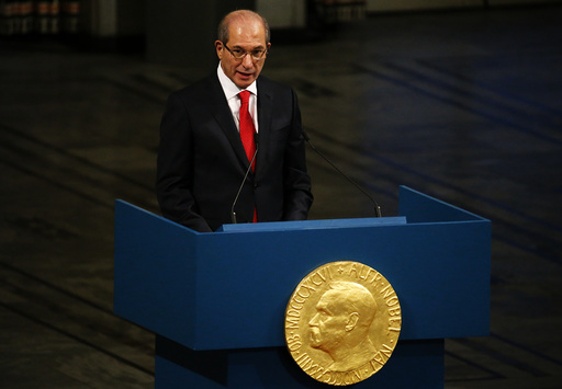 Uzumcu, director general of the OPCW delivers a speech during the Nobel Peace Prize awards ceremony at the City Hall in Oslo