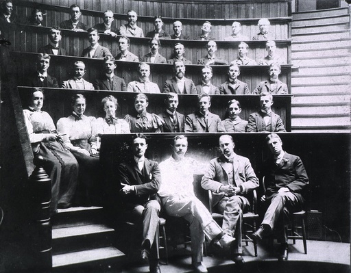 Professors Harvey Cushing, Howard Kelly, Sir William Osler, and William S. Thayer (front row) sit wi