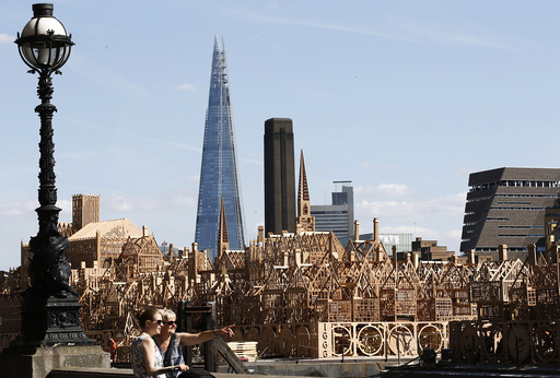 A 120-metre long sculpture of a 17th-century London skyline is completed for an event where it will be set alight re-telling the story of the 1666 Great Fire of London
