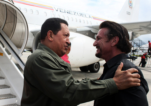Venezuela's President Chavez talks with US actor and director Sean Penn in Cumana