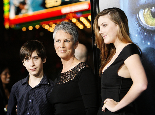 Actress Curtis poses with her children Thomas and Annie at the premiere of 