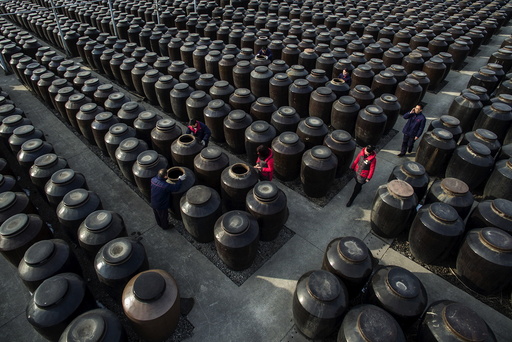 Employees work at a vinegar mill in Zhenjiang