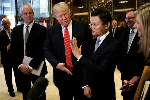 U.S. President-elect Donald Trump and Alibaba Executive Chairman Jack Ma speak with members of the news media after their meeting at Trump Tower in New York, U.S.