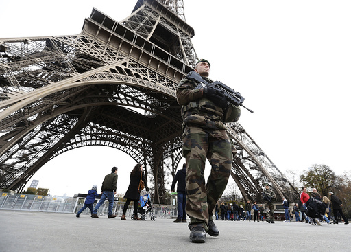 French military patrol near the Eiffel Tower the day after a series of deadly attacks in Paris