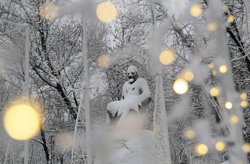 A view shows a monument to Kazakh poet Abai Kunanbayev after a heavy snowfall in Moscow