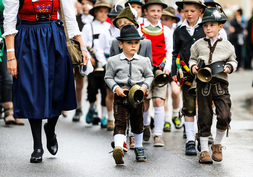 People in traditional Tyrolean clothes attend a parade at the annual Gauner Festival in Zell am Ziller