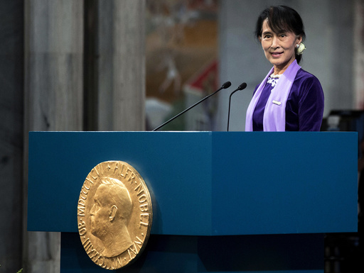 Myanmar opposition leader Aung San Suu Kyi delivers her Nobel acceptance speech during a ceremony at Oslo's City Hall